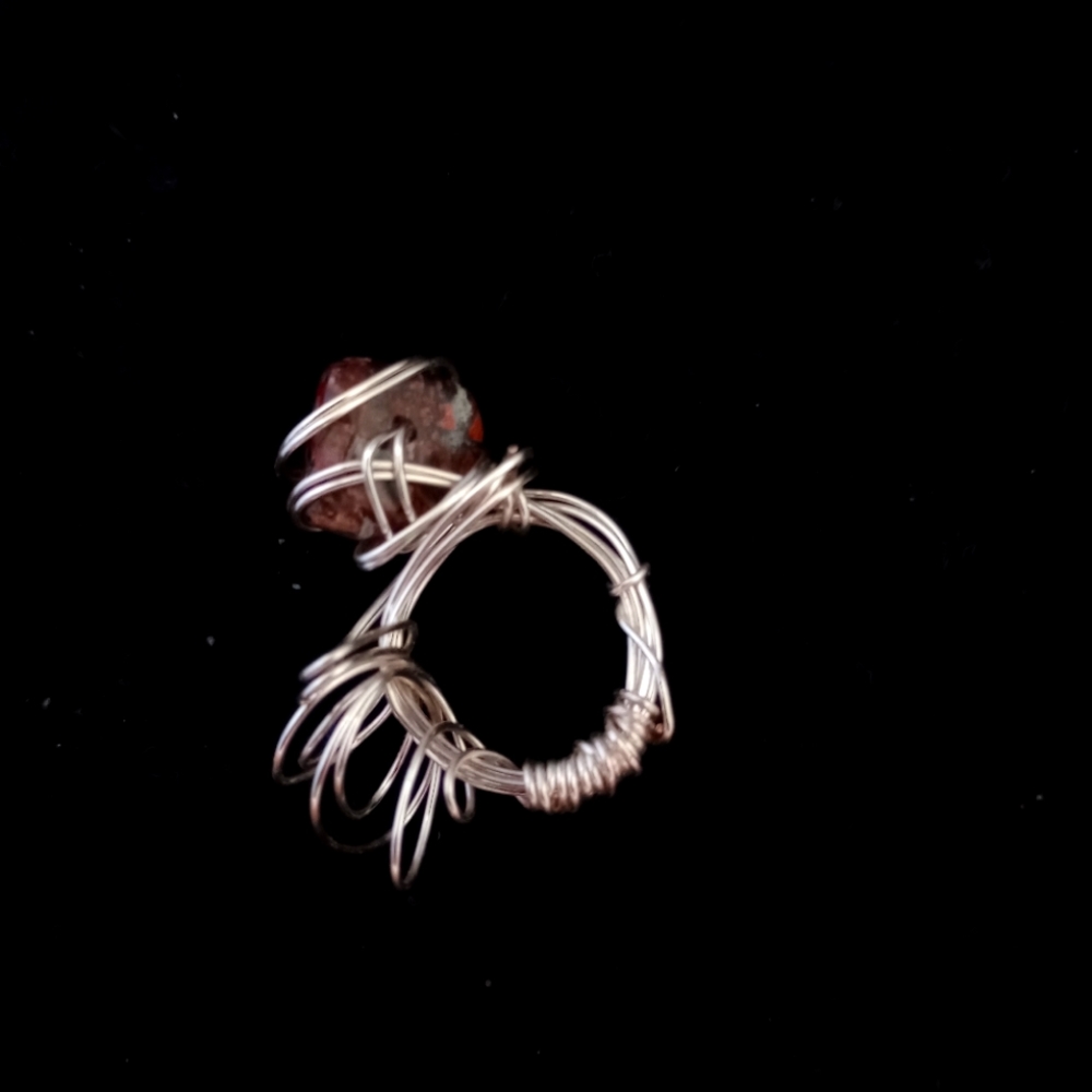 Wire-wrapped red and brown stone ring